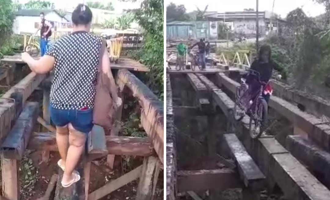 Moradores se arriscam atravessando sobre vigas da ponte do Judia